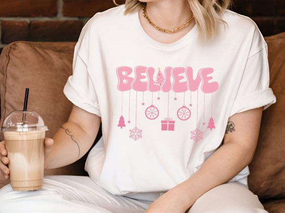 Believe Pink Retro Christmas T-Shirt: A Graphics Gem for T-Shirt Designs